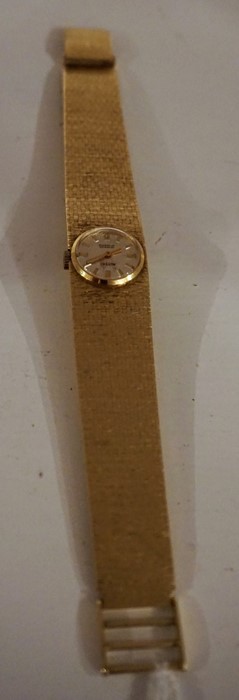 A Mistas 14ct Gold Ladies Wristwatch, The silvered dial having baton numerals, stamped 14k to