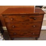 A Victorian Mahogany Chest of Drawers, With three large drawers, raised on turned feet, 93cm high,
