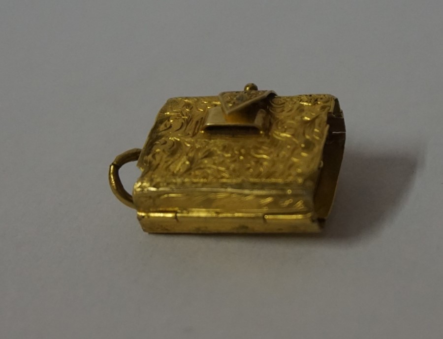 An Engraved Yellow Metal Mourning Locket, In the form of a box, probably gold, weight 10.6 grams,