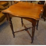 A Victorian Mahogany Window Table, With a shaped top, raised on turned legs, 71cm high, 65cm wide
