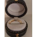 A 18ct Gold Ladies and Diamond Ring, Set with a single diamond, shaped in the form of a heart,
