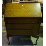 A Mahogany Writing Bureau, With a fall front above three drawers, 101cm high, 75cm wide, 44cm deep