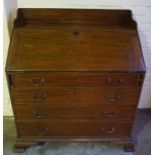 A 19th Century Mahogany Writing Bureau, With an added three quarter gallery top above a hinged