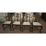 A Set of Four Mahogany Dining Chairs, With detachable seats, raised on cabriole legs with ball and