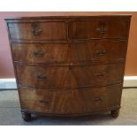 A Victorian Mahogany Bow Front Chest of Drawers, With two small drawers above three graduated