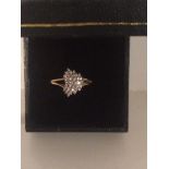 A 14ct Gold Ladies Diamond Cluster Ring, with open shoulders, ring size L1/2