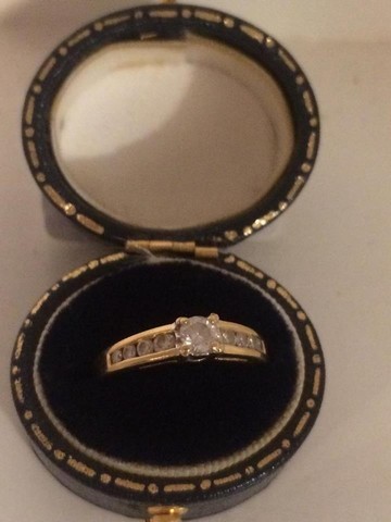 A 18ct Gold Ladies Dress Ring, Set with stones, stamped 18k, ring size L1/2