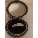 A 18ct Gold Ladies Dress Ring, Set with stones, stamped 18k, ring size L1/2