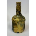 An Antique Green Glass Bottle, 24cm high