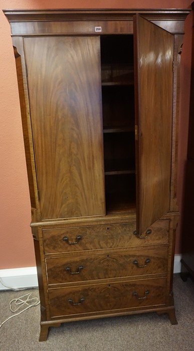 A Mahogany Linen Press, circa 19th century, With two large doors enclosing a shelved interior, above - Image 2 of 2