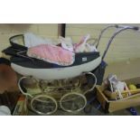 A Vintage Dolls Pram by Tri-Ang, 74cm high