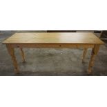 A Pine Refectory Table, Raised on turned legs, 78cm high, 183cm wide, 66cm deep
