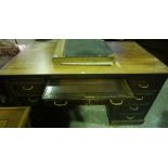 A Large Oak Secretaire Desk, circa early 20th century, With a secretaire drawer, flanked by four