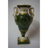 A Porcelain Urn Shaped Vase, Probably by Paris porcelain, with swan handles and gilded decoration on