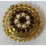 A Fine 18ct Gold Ruby and Seed Pearl Brooch, Of balloon shape, Decorated with a central ruby