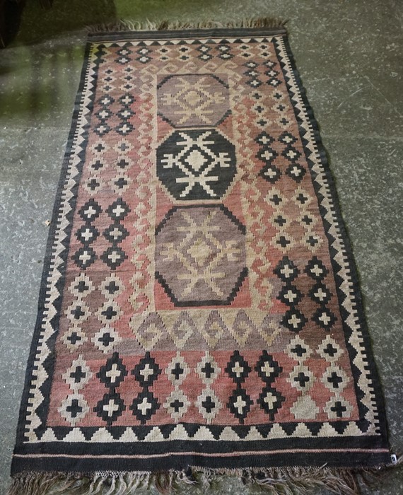 Two Similar Persian Rugs, Both decorated with geometric motifs on pink ground, 121cm x 94cm, 206cm x