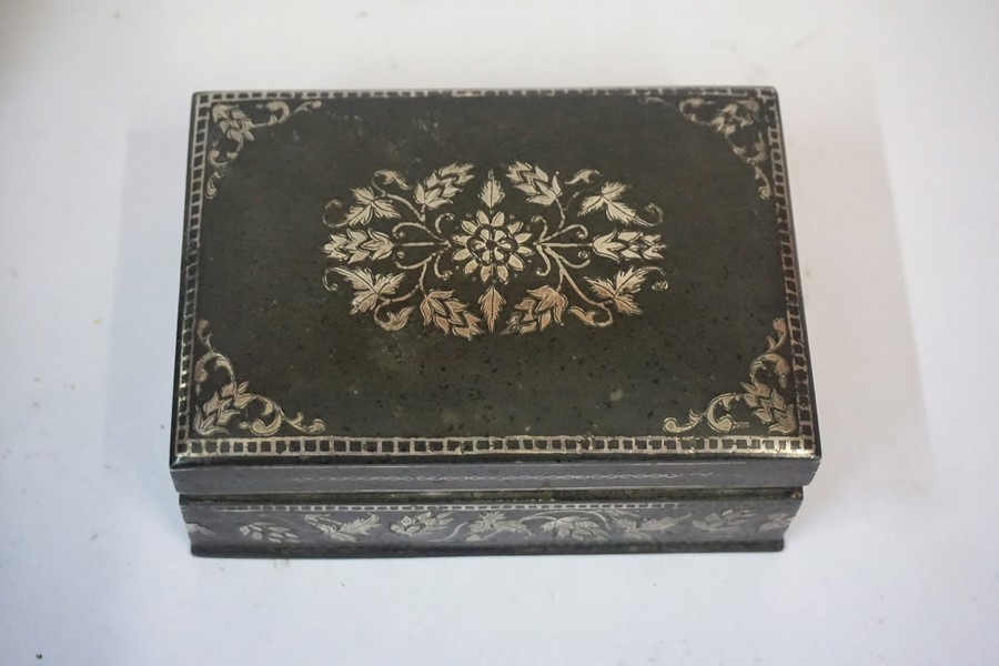 A Niello Style Silver and Gold Leaf Overlaid White Metal Cigarette Box, circa early 20th century, - Image 4 of 4