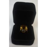 A 9ct Gold Citrine Dress Ring, Set with a large citrine stone measuring approximately 2cm