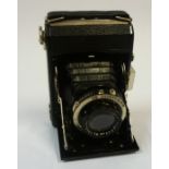 A Zeiss Icon "Compur Rapid" Vintage Camera, With a concertina action, 12cm high, with original