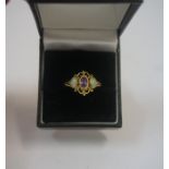 A 9ct Gold Opal and Amethyst Dress Ring, circa late 19th century, Set with a small Amethyst stone,