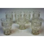 Seven Matching Crystal Tumblers, circa early 20th century, of shaped form with star cut bases,