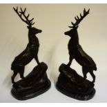 After Mogniez A Pair of Bronze Figures of Stags, raised on veined marble bases, 45cm high, (2)