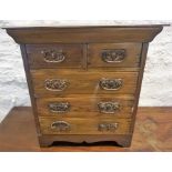 A Late Victorian Apprentice Chest, With two small drawers above three long drawers, 44cm high,