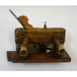 A Wood Plough Plane, circa early 20th century, stamped Thompson, with brass mounts and screw, 22cm