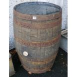 A Large Wooden and Metal Bound Barrel, 88cm high