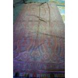 An Antique Paisley Pattern Shawl, has some age tears to areas, 326cm x 140cm