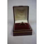 A 10ct Gold Diamond Solitaire Ring, Set with a small diamond, stamped 10ct, overall weight 2.1