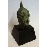 A Thai U Thong Style Cast Bronze Head of a Buddha, circa late 19th/early 20th century, wearing a