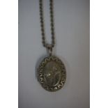 A Silver Locket on Chain, Engraved to the obverse, 24cm long