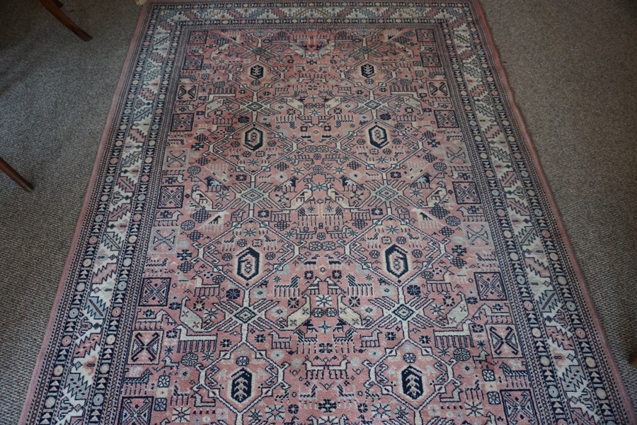 A Nerahbad Machine Made Rug, Decorated with Geometric motifs on a pink ground, 215cm x 141cm - Image 3 of 4