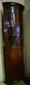 A Mahogany Corner Cabinet on Cupboard Base, circa early 20th century, The top section having an