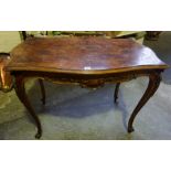 A French Walnut Side Table, 20th century, Having a kingwood panel to the top and serpentine front,