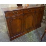 A Reproduction Sideboard, With three small drawers above three doors, 90cm high, 142cm wide, 40cm