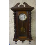 A Mahogany Cased Vienna Wall Clock, circa early 20th century, with a twin train enamel dial, with