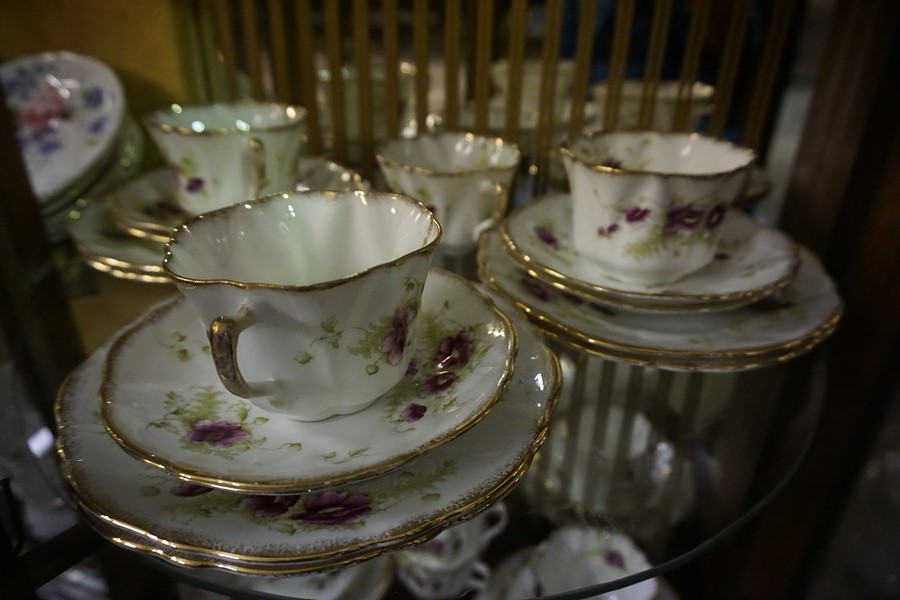 A Quantity of China Tea Wares, To include a Longton Wellington 40 piece china tea set, a Coalport 18