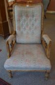 An Arts & Crafts Liberty Style Buttonback Parlour Armchair, Decorated with ying yang style roundels,