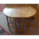 A Small Gateleg Table, Having D ends, 52cm high, 68cm long, 54cm wide