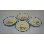 A Porcelain Eight Piece Fruit Service, circa early 20th century, Decorated with a floral panel and