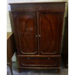 A Vintage Mahogany Gecophone Cabinet, Having two panelled doors above a single drawer, metal carry