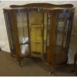 A Vintage Walnut China Cabinet, Enclosing glass shelves, 119cm high, 118cm wide, 37cm deep