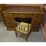 A Late Victorian Mahogany Kneehole Desk, Having three drawers above three drawers to each