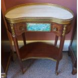 A French Style Kidney Shaped Lounge Table, 20th century, Having a gallery rail above a single drawer