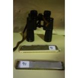 A Pair of Lieberman & Gortz Binoculars, 17cm high, also with two Chinese harmonicas, (3)