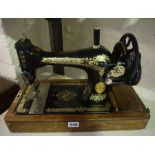 A Vintage Singer Portable Oak Cased Sewing Machine, 44cm wide