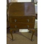 A Ladies Mahogany Writing Bureau, With fall front above two drawers, raised on pad foot, 100cm high,