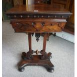 A Regency Rosewood Tea Poy, circa early 19th century, Having a hinged top enclosing fitted